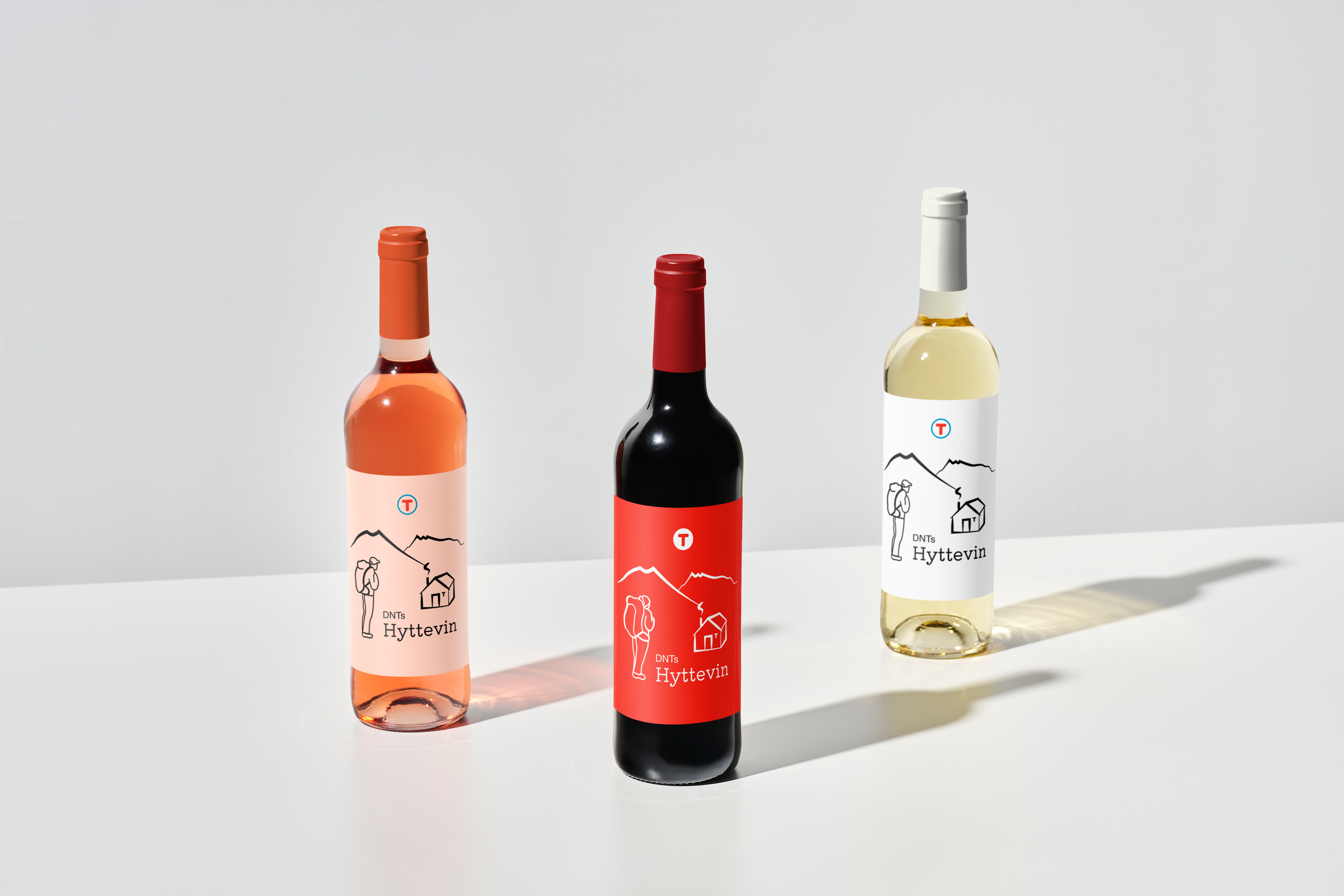 Three wine bottles with DNT label design
